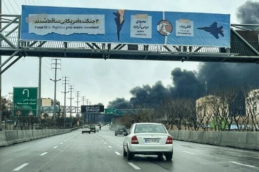 As Tehran residents returned to work on Sunday, black smoke from Israeli oil depot strikes rise into the air