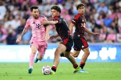 Lionel Messi battle's New York's teenage midfielder Adri Mehmeti during Inter Miami's 2-2 draw