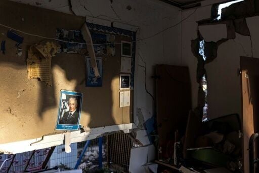 A portrait of Israeli Prime Minister Benjamin Netanyahu on the wall of a kindergarten damaged in an Iranian missile strike in Dimona on March 22