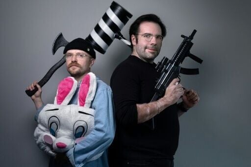 American comics creator James Tynion IV (R) poses with Canadian visual artist and writer Michael Walsh