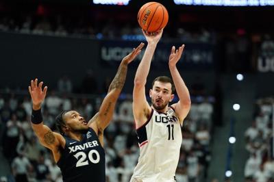 Fresh off OT win, No. 11 UConn out to keep Butler reeling