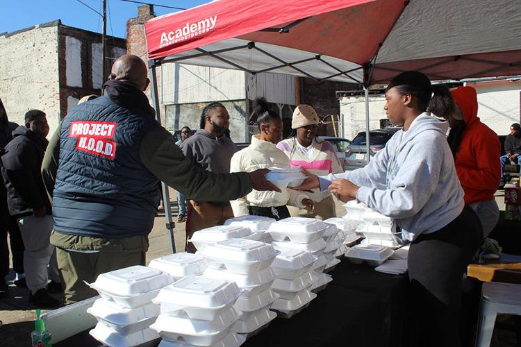 Project Hood Corey Brooks handing out food