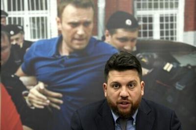Russia sentences in absentia Navalny ally to 18 years