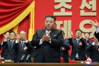 Delegates applaud as North Korean leader Kim Jong Un is re-elected as general secretary of the ruling Workers' Party.