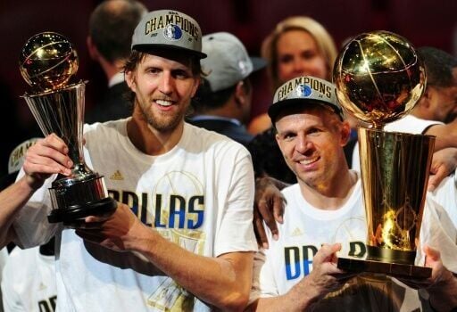 Dirk Nowitzki (left) wins the title with the Dallas Mavericks alongside Jason Kidd.