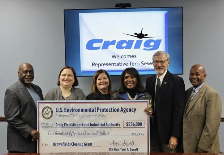 Sewell presents checks from EPA for projects in Selma
