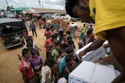 Rohingya refugee food aid to be halved from next month: UN