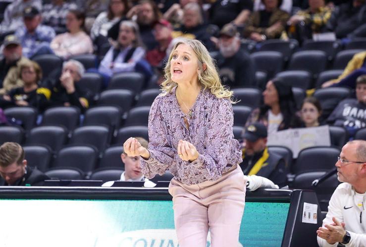 Mizzou head coach Kellie Harper shouts from the sideline