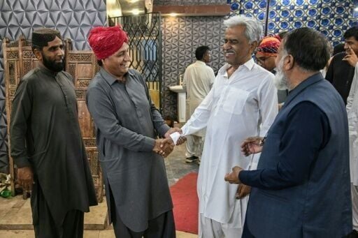 Partab Shivani, a Hindu social activist (second left), is fasting for Ramadan this year