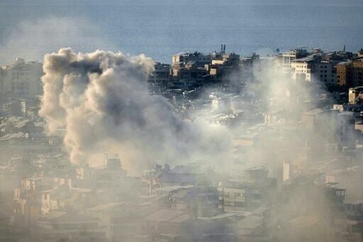 Smoke rises from the site of an Israeli airstrike in Beirut's southern suburbs