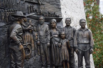 A sculpture of enslaved men, women and children seen in Alabama Bicentennial Park in Montgomery, Alabama on January 24, 2023. Alabama was a slave state from 1819 to 1865, and Montgomery was a major slave trading destination. (Brian Lyman/Alabama Reflector)