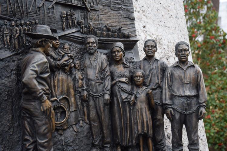 A sculpture of enslaved men, women and children seen in Alabama Bicentennial Park in Montgomery, Alabama on January 24, 2023. Alabama was a slave state from 1819 to 1865, and Montgomery was a major slave trading destination. (Brian Lyman/Alabama Reflector)