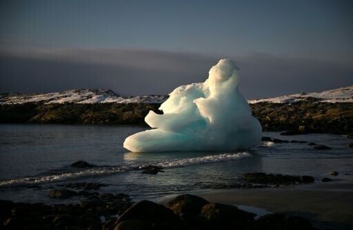 An ice block on the shore in Nuuk, western Greenland. The Antarctic and Greenland ice sheets have both lost significant mass