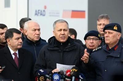 Turkey's Interior Minister Ali Yerlikaya, centre, has announced hundreds of arrests of Islamic State suspects in the past week