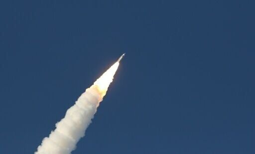 The Artemis II rocket with the attached Orion spacecraft soaring into orbit after lifting off from Launch Pad 39B at the Kennedy Space Center in Cape Canaveral, Florida on Wednesday