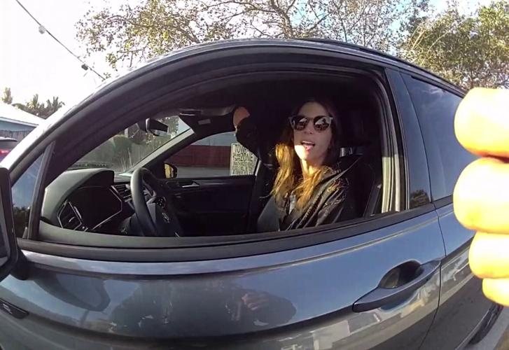 Moment Florida cop accuses disabled one-handed driver of texting whilst driving