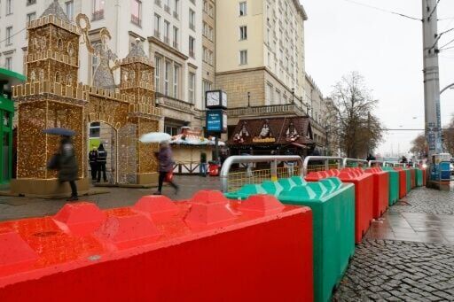 Red and green concrete blocks have been installed as safety barriers around the Christmas market