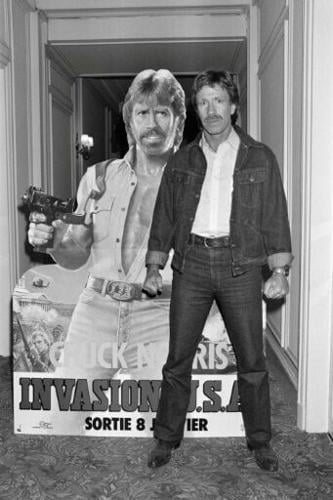 Chuck Norris poses in Paris in 1985 for his movie 'Invasion USA'