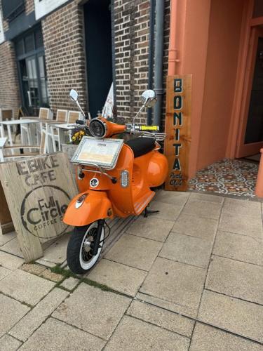 Parking ticket issued to restaurantÂ’s decorative bike mascot