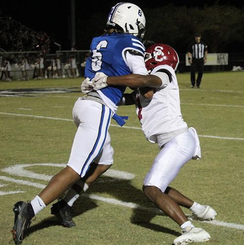 Demopolis 6 gets tackled.jpg