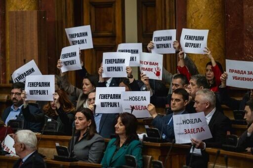 Chaos as Serbia opposition set off flares in parliament to back protests