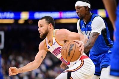 Curry dazzles with 56 points as Warriors hold off Magic