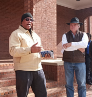 Tuscaloosa developer delivers $100,000 check for tornado relief