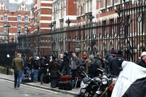 The media waits outside the High Court in London on the first day of Harry's case against a top UK newspaper publisher
