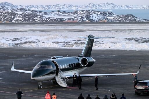 Danish Prime Minister Mette Frederiksen was greeted by Greenland's Prime Minister Jens-Frederik Nielsen at the airport in Nuuk