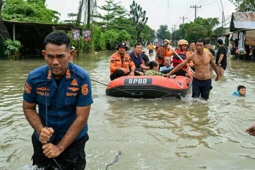 Authorities in Indonesia are trying to reach residents cut off by flooding and landslides