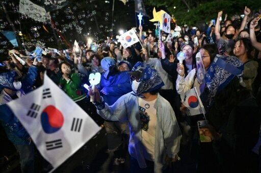 South Korea's new leader vows to 'heal wounds' with nuclear-armed North