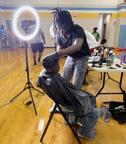 Haircuts at back to school event