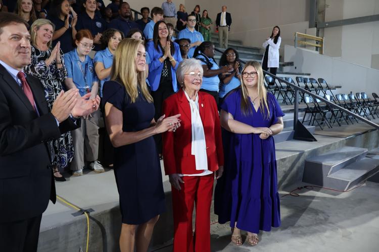 Ivey with student and principal.JPG