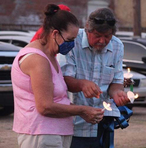 Dozens gather for candlelight vigil held for fallen officer, others lost to violence in Selma, photo gallery