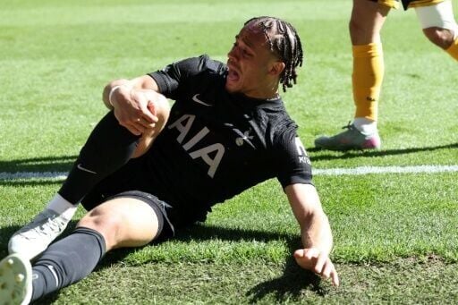 Tottenham's Dutch midfielder Xavi Simons faces a long lay-off after suffering a serious knee injury