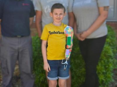 Young Lego fan given prosthetic arm built using real Lego