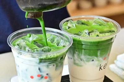 Matcha lattes are prepared at a cafe in the Los Feliz neighborhood of Los Angeles in May 2025.