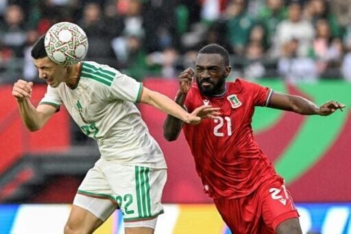 Ibrahim Maza (L) scores for Algeria in their win over Equatorial Guinea in Rabat
