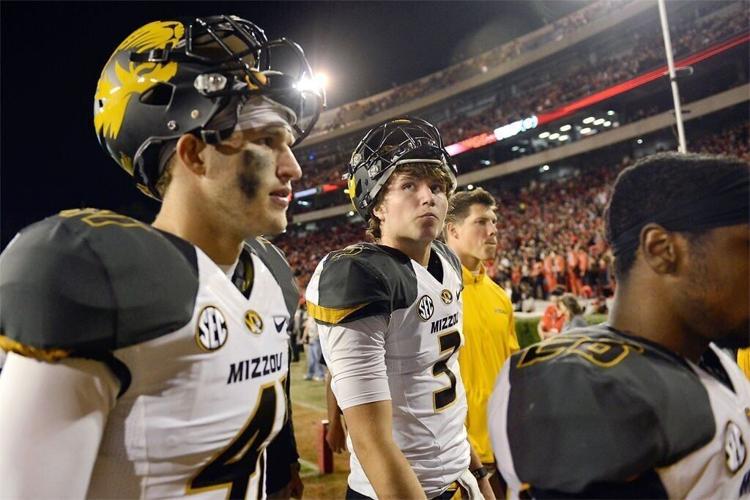 Missouri quarterback Drew Lock walks off the field (copy)
