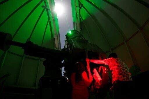 Stargazers marvel at 'Blood Moon', rare total lunar eclipse