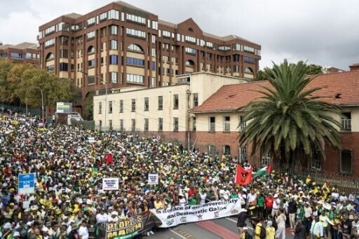 Thousands of South Africans marched 'in defence of our sovereignty' in the face of pressure from US President Donald Trump