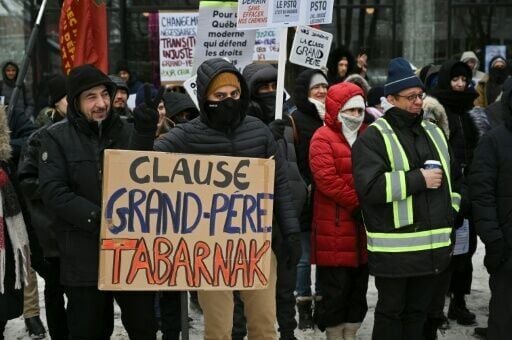 Pro-immigration protesters in front of the Quebec Immigration Ministry in Montreal, Canada