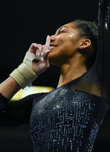 Railey Jackson poses after sticking her vault routine