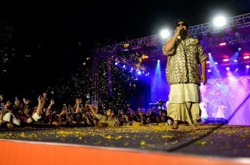 Artist Nirdosh Sobti of Madhava's Rock Band sings a Hindu spiritual song called a 'bhajan' at the Purana Qila in New Delhi on March 1, 2026