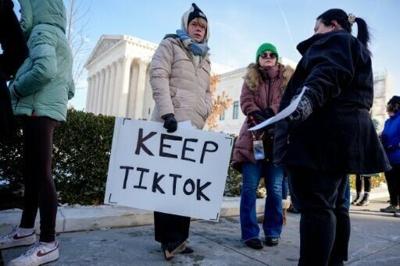 Trump says US in talks with four groups over TikTok sale