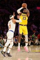 Doncic, James lead Lakers fightback as Knicks downed in thriller