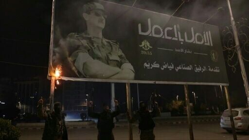 Syrian rebels surround Hama 'from three sides', monitor says