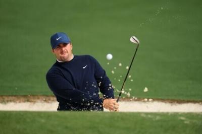 World number 11 Chris Gotterup of the United States plays a shot from a bunker on the second hole during a practice round ahead of his Masters debut at Augusta National