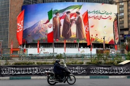 Billboards in Tehran have sought to underline the continuity between the two men
