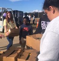 MCS volunteers help Selma Area Food Bank with November food distribution